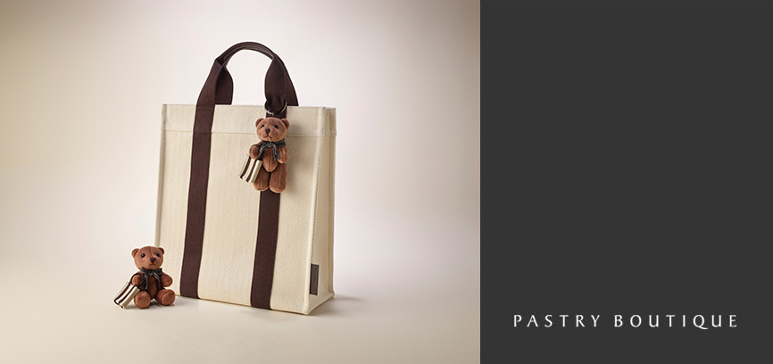 An image of Pastry Boutique's New eco-bag with a Silla Bear Keyring.